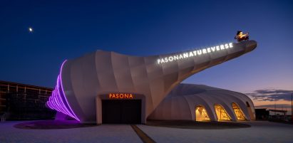 Exterior view of the Pasona Natureverse Pavilion at night