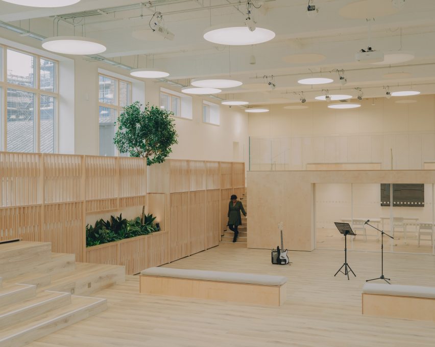 Timber-lined teaching space The Pool