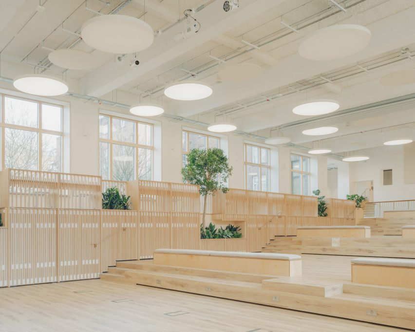 Space finished with pale-toned timber and plants