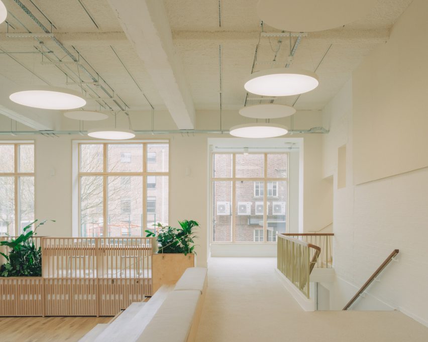 Large windows looking out of Studio Dera retrofit project