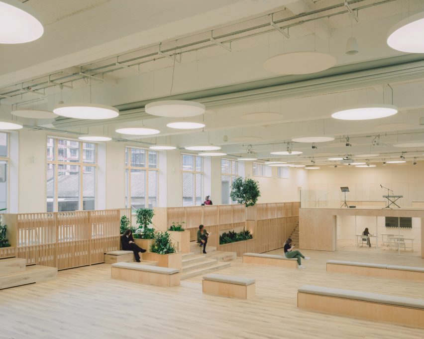 Multi-level educational space with timber finishes