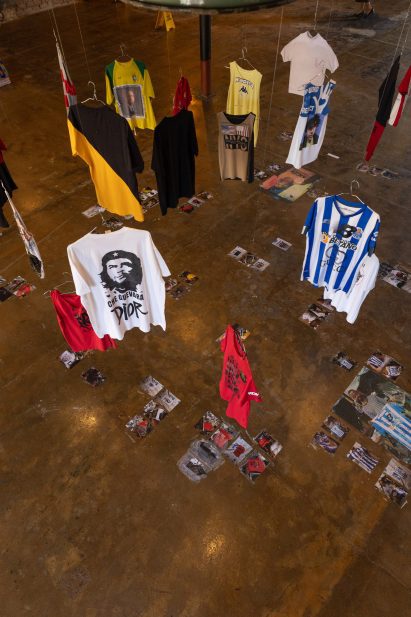 T-shirts hanging from the ceiling on hangers