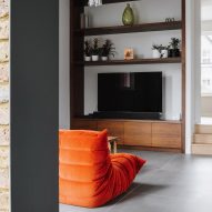 A den in The Weathered Steel House by Selencky Parsons