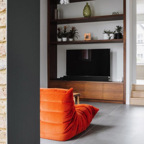 A den in The Weathered Steel House by Selencky Parsons