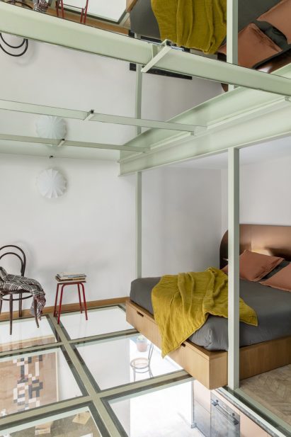 Bedroom with glass floor in RA House by StudioTamat