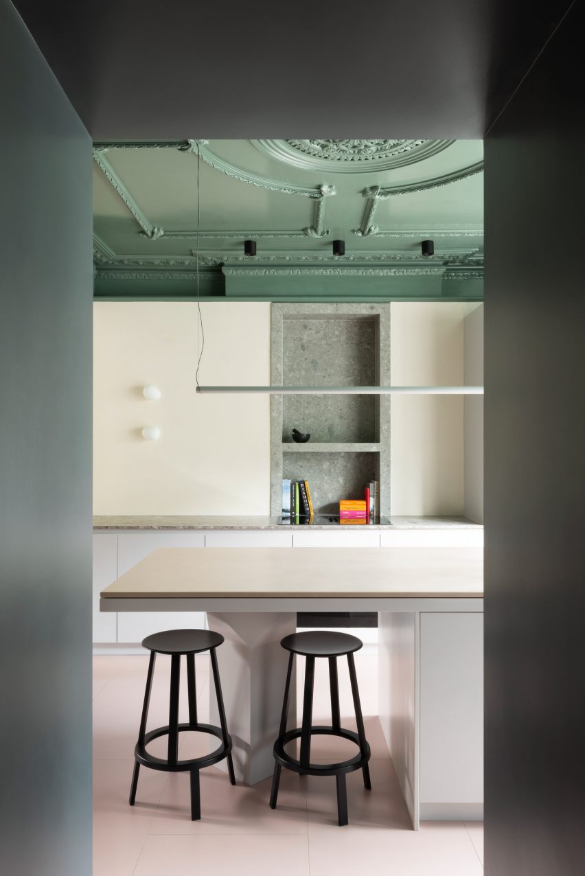 Kitchen with glossy green ceiling