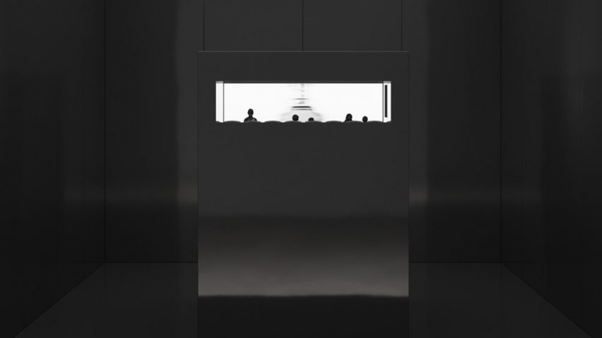 Photo of a dark installation with a lightbox