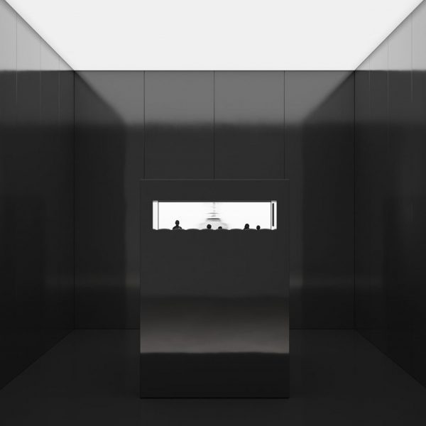 Photo of a dark installation with a lightbox