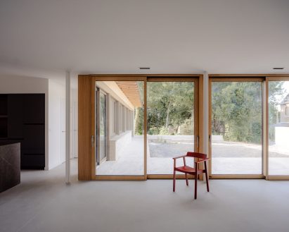 Living space interior at House on Rue de Clermont by A.TM