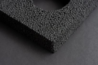 Close-up photo showing the bubbly cells within Carbon Cell foam