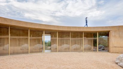 Person walking on top of circular house Mexico
