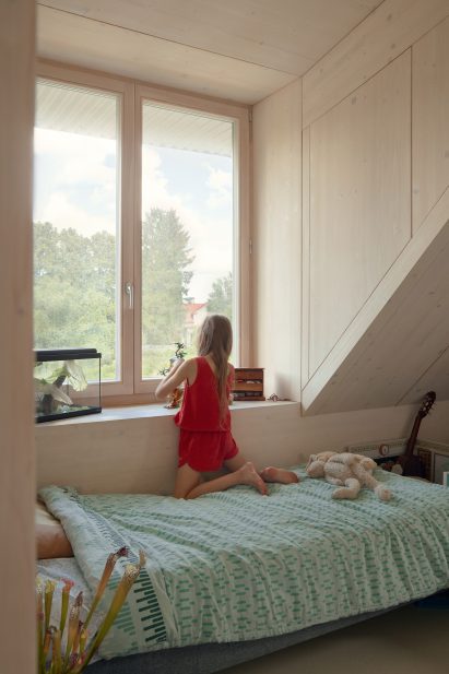 Wood-lined bedroom