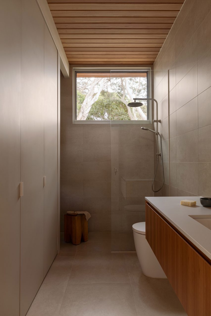 Bathroom with shower and window