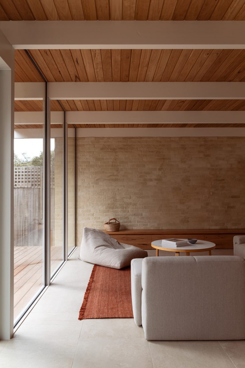 Living space with orange rug