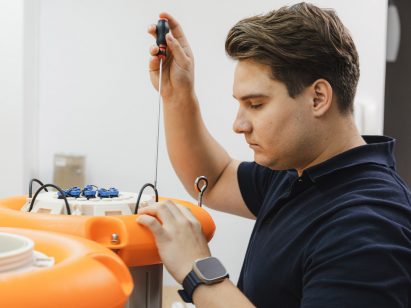 Filip Budny tinkering with his WaterSense buoy