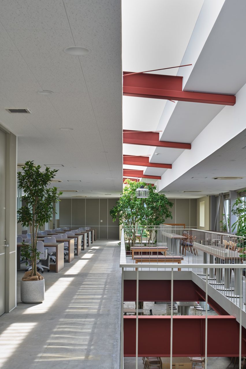 Second floor workspace arranged around atrium