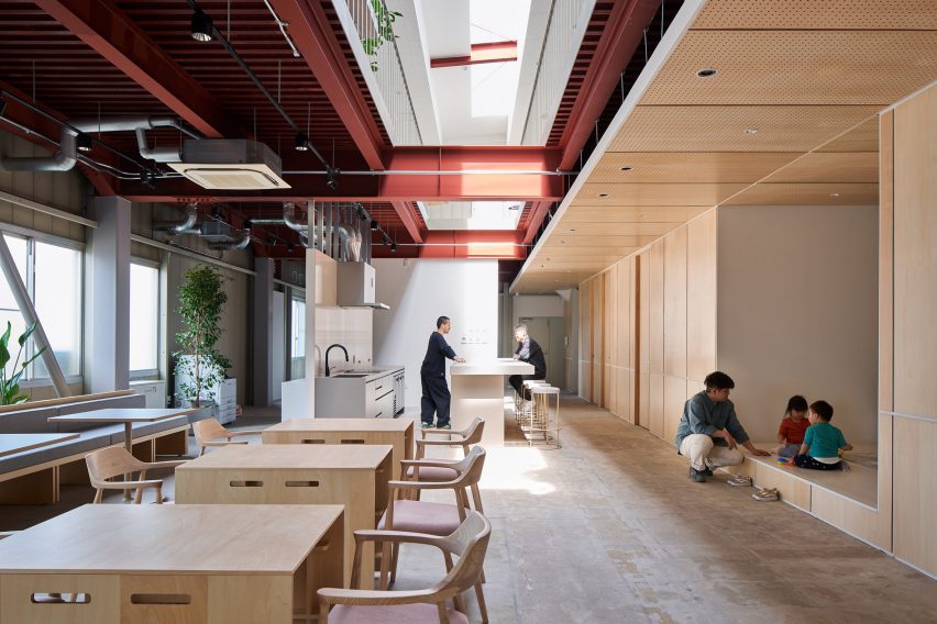 Communal office space with plywood walls