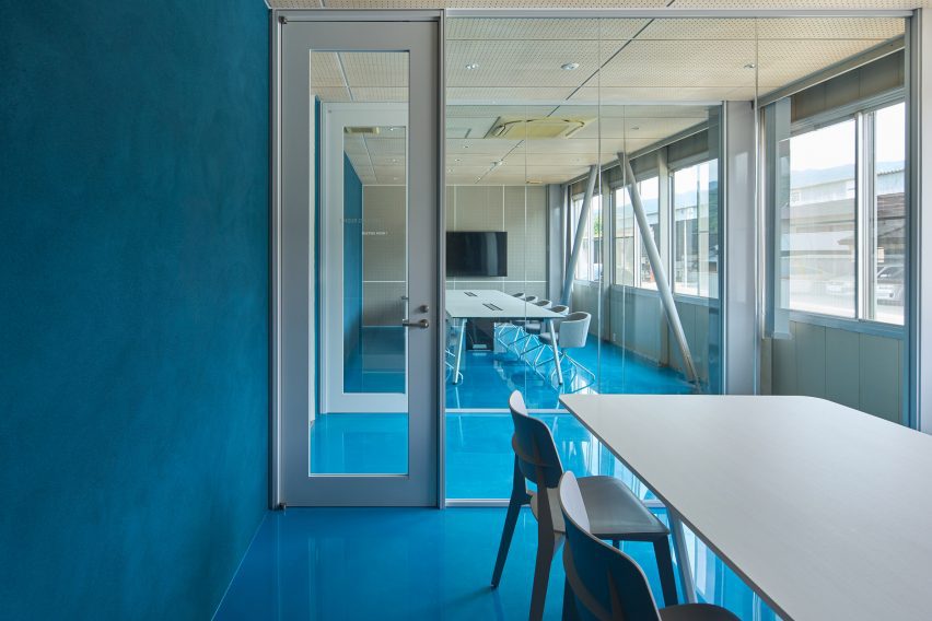 Meeting room with blue walls and floor
