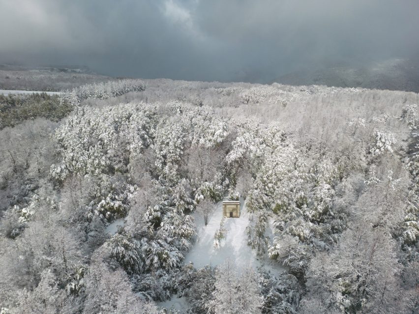 Aerial view Miel Pavilion by Pezo von Ellrichshausen in forest clearing