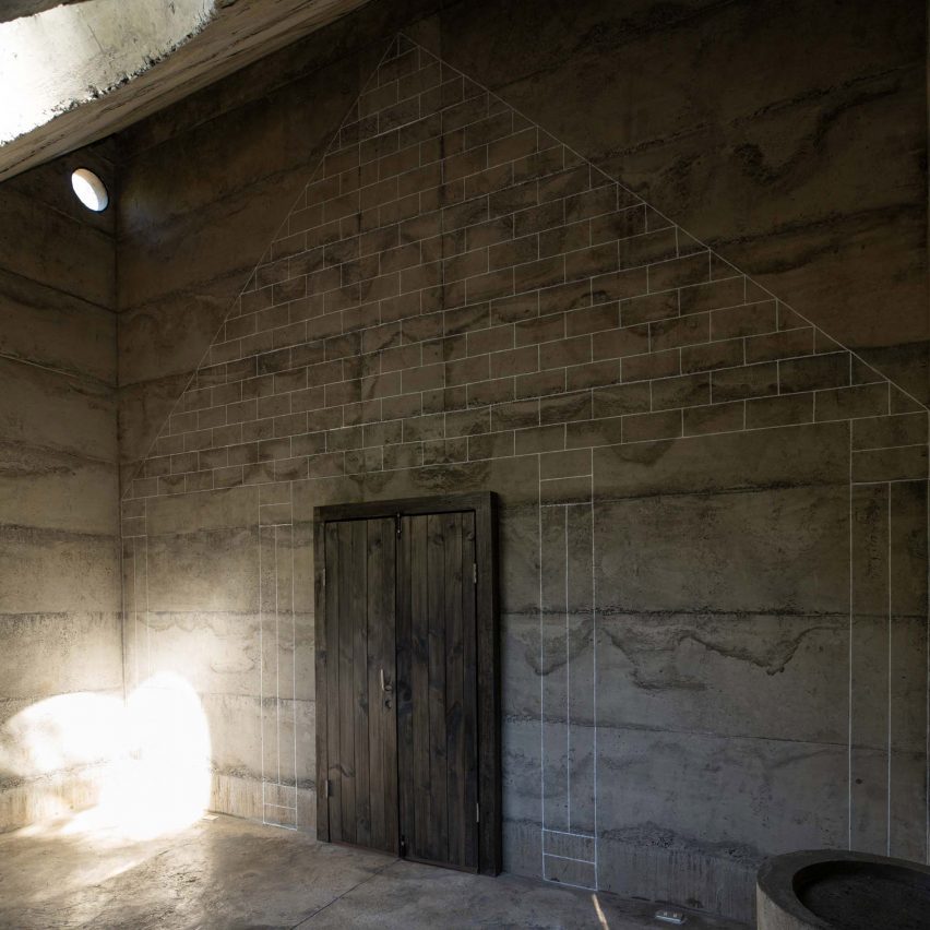 Door and mural inside concrete Miel Pavilion by Pezo von Ellrichshausen
