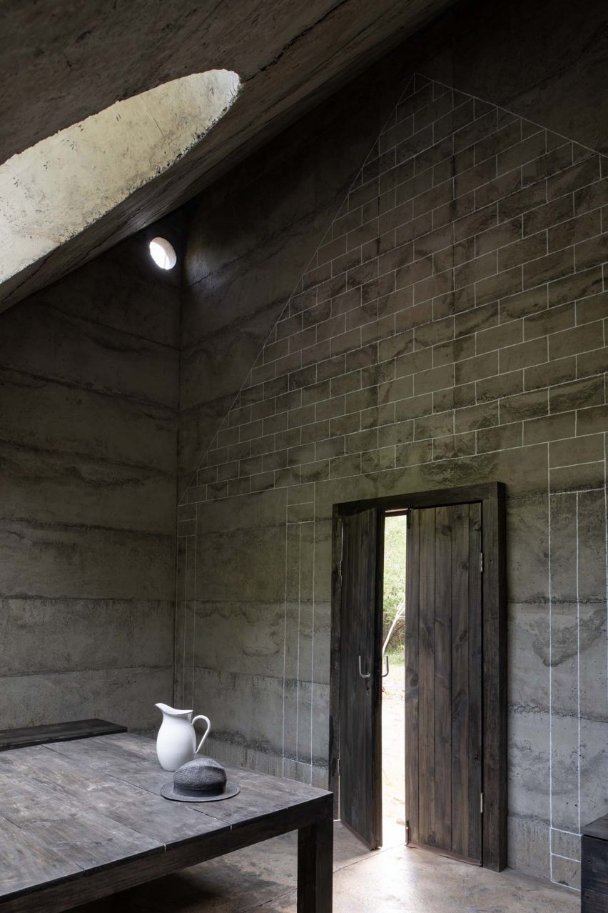 Door and mural inside concrete Miel Pavilion by Pezo von Ellrichshausen