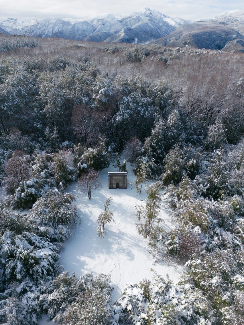 Aerial view Miel Pavilion by Pezo von Ellrichshausen in forest clearing