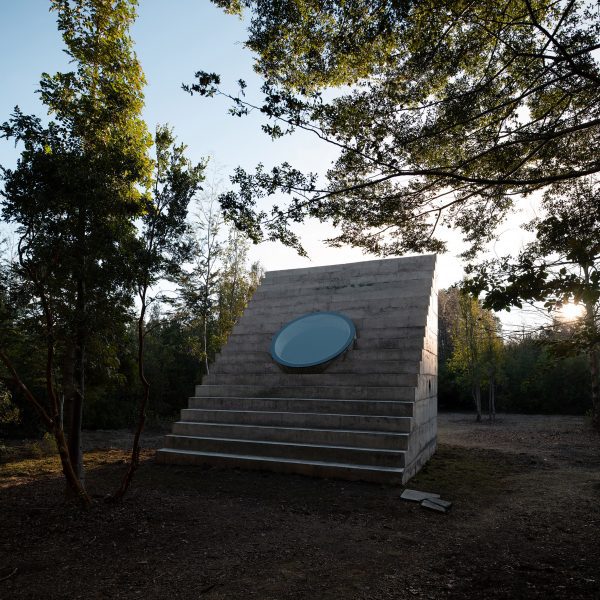 Rear wall and oculus of Miel Pavilion by Pezo von Ellrichshausen