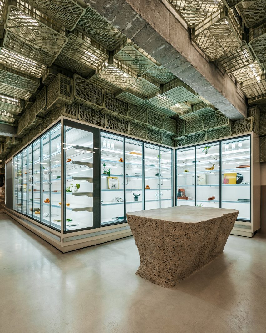 Concrete table in front of fridges