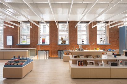 Brickwork wall at the back of a brightly lit retail space