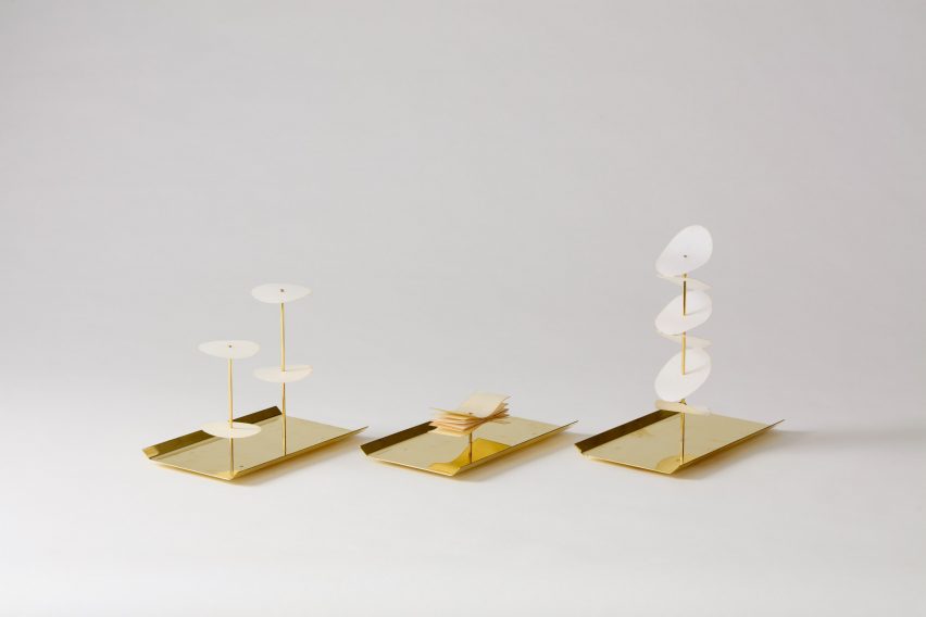 a series of gold and white ornaments
