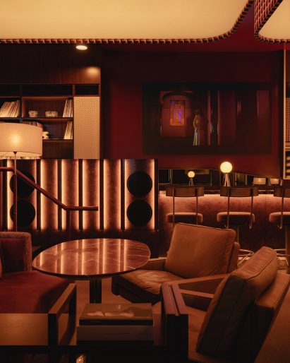 Lounge space with moody decor and lighting