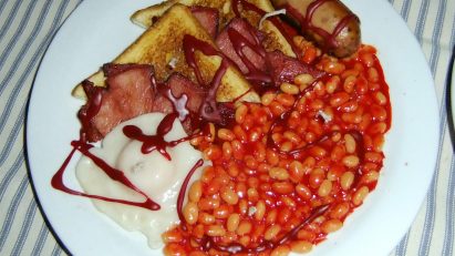 a candle shaped like a full english breakfast