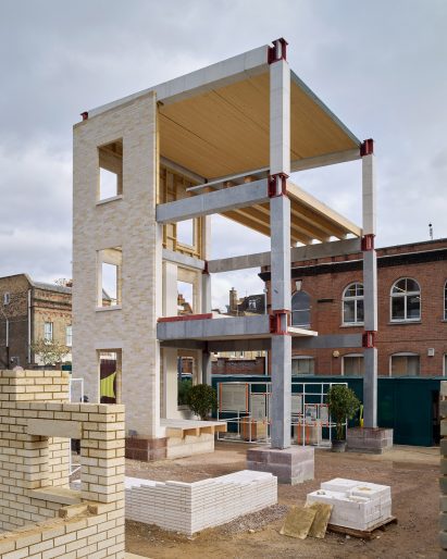 Photo of the back of the Stone Demonstrator, showing a building frame made of pre-tensioned stone columns and beams