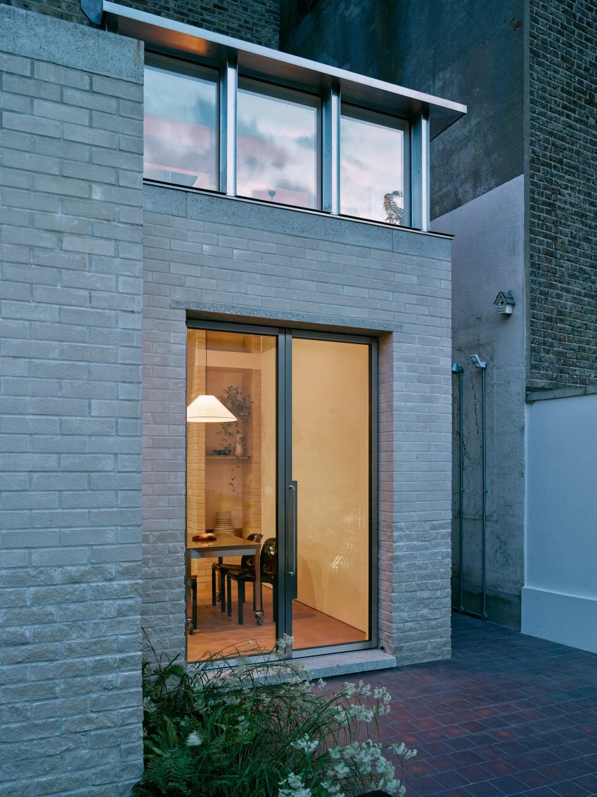 Rear elevation of Stone and Steel House extension by DGN Studio and Sarah Izod