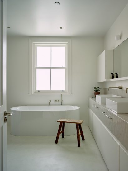 Bathroom in Stone and Steel House extension by DGN Studio and Sarah Izod