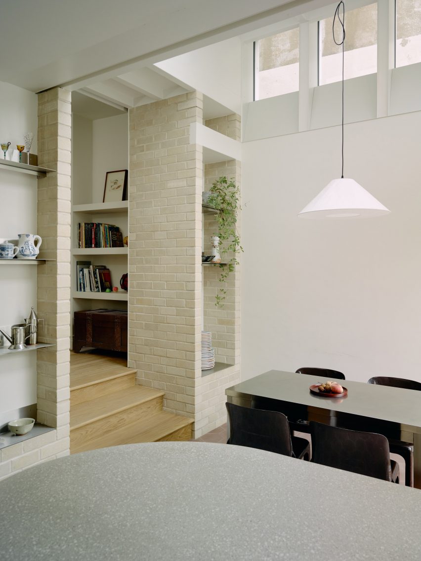 Kitchen and dining room in Stone and Steel House extension by DGN Studio and Sarah Izod