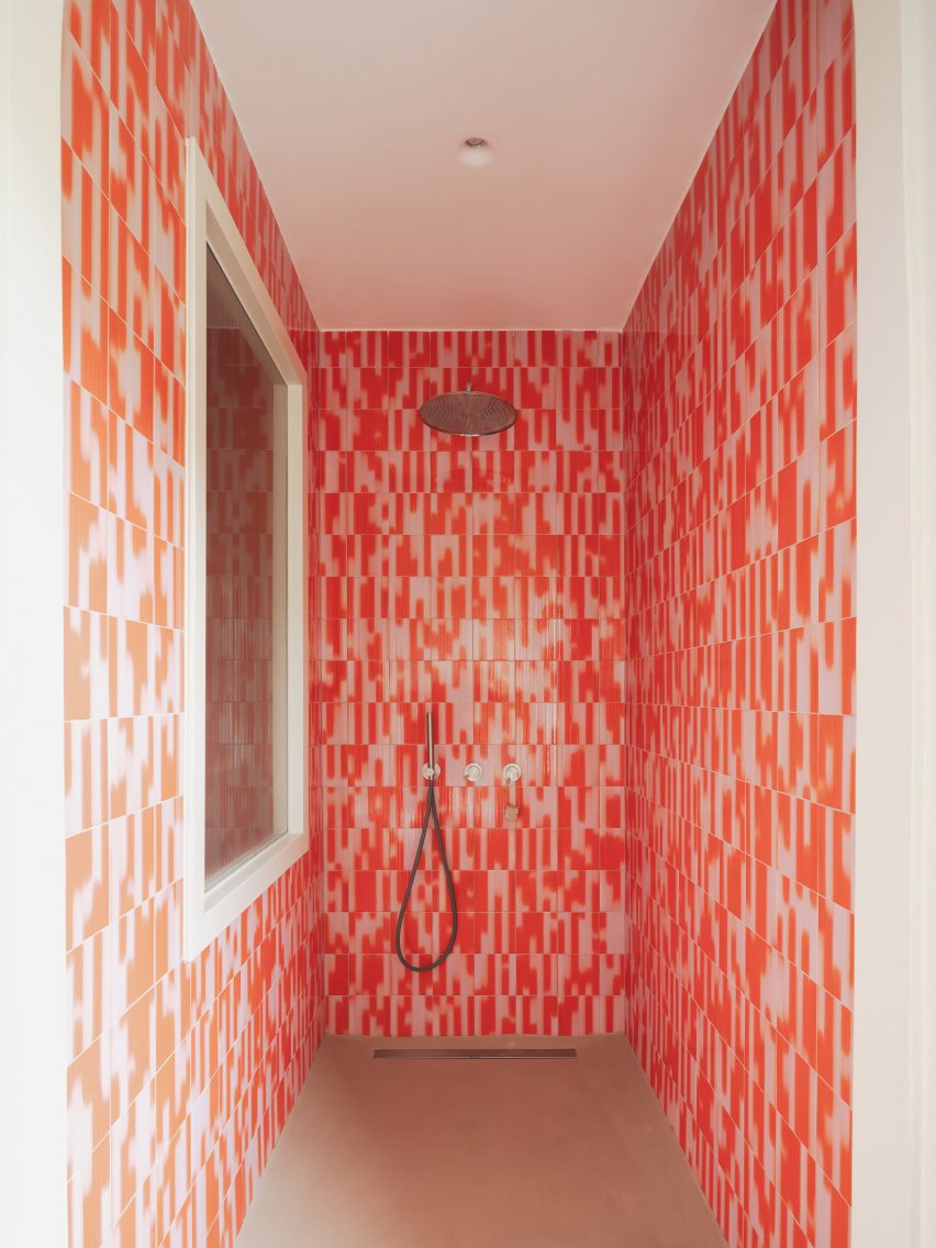 Shower room with Palet tiles in revamp of 1960s villa by StudioTamat