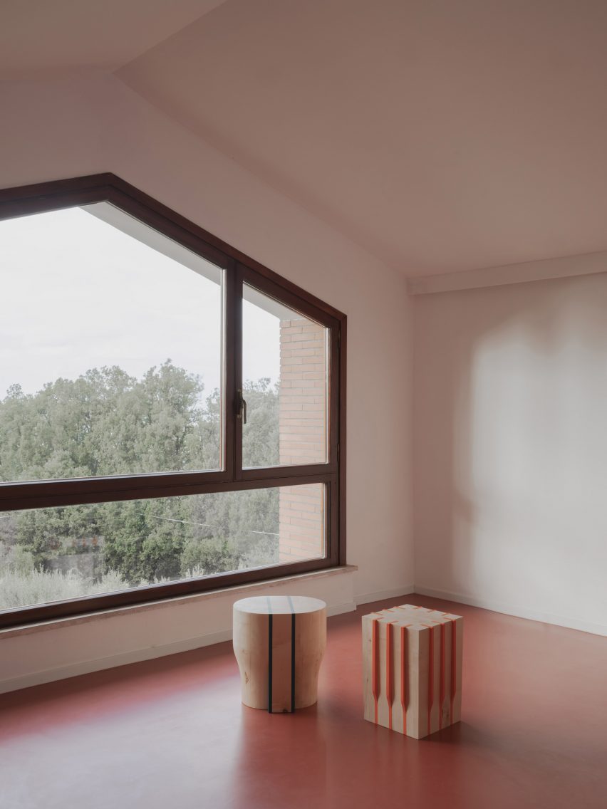 Loft with rubber floors in revamp of 1960s villa by StudioTamat