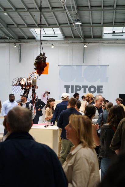 Photo of people mingling at the opening night of Tiptoe's 10 Years – 10 Visions exhibition