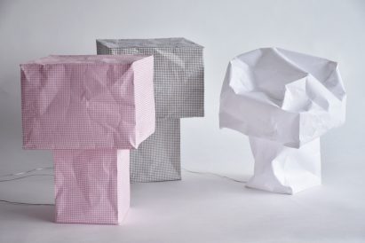 Paper lamps on white background