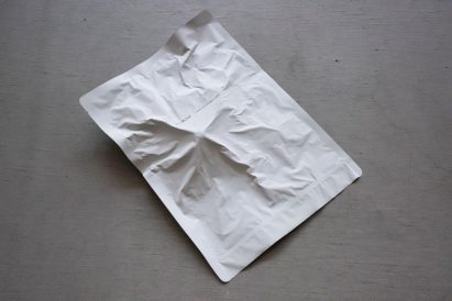 White envelope on grey surface