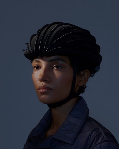 Person wearing an inflatable helmet