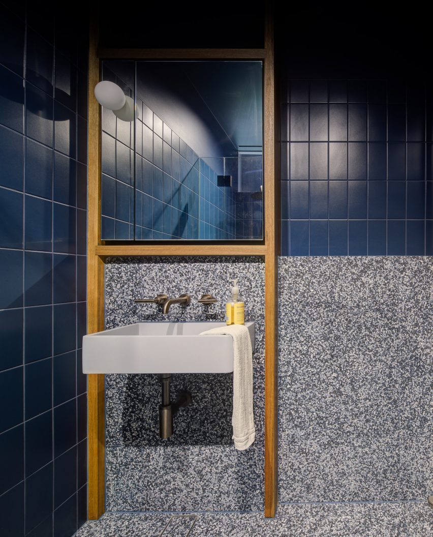 Bathroom with deep blue tiles