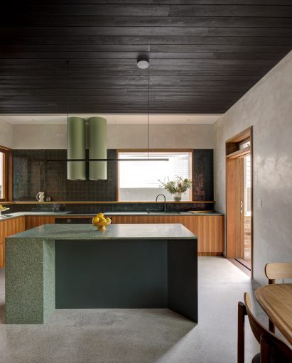 Kitchen with green island
