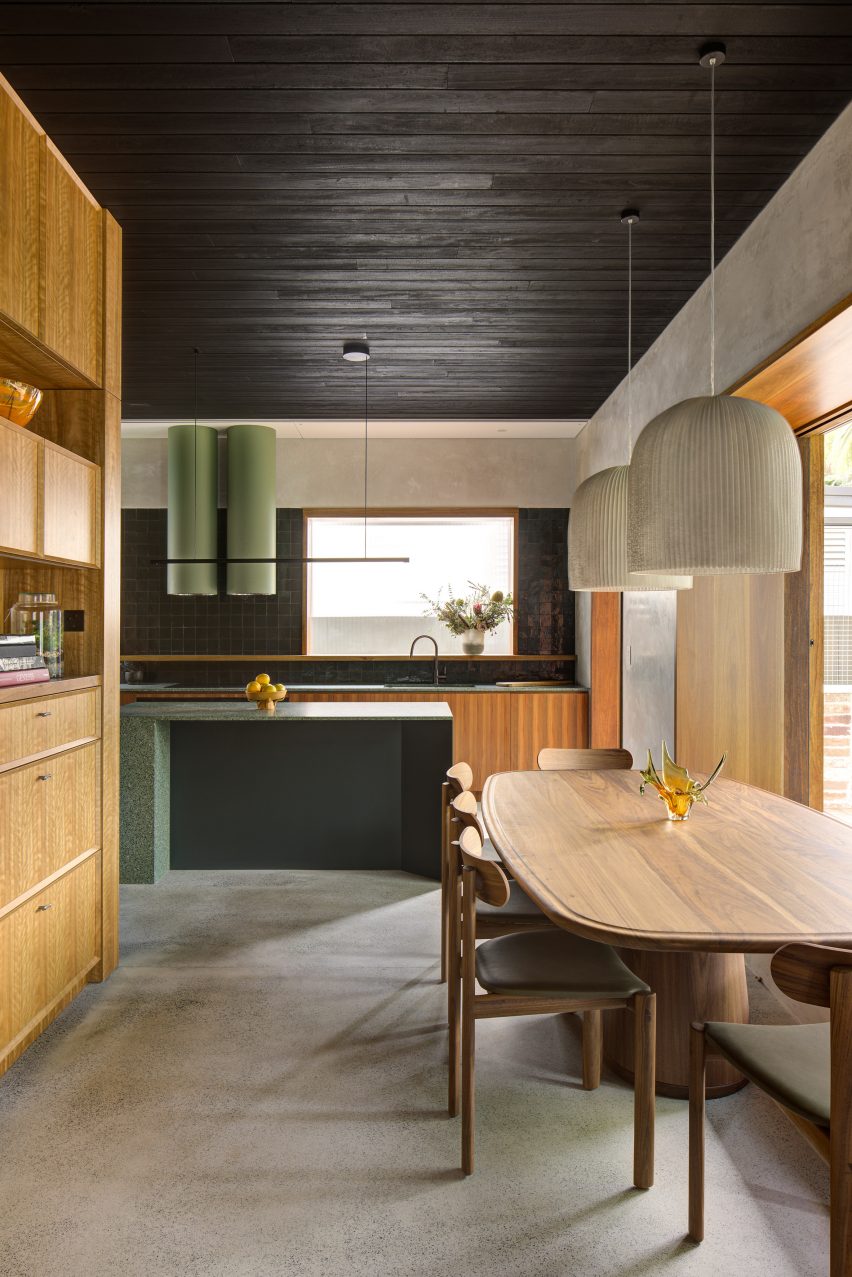 Dining and kitchen space with wooden table