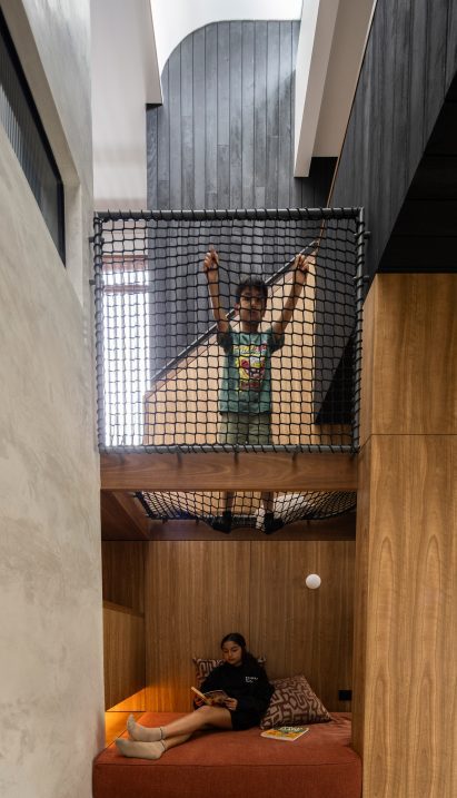 Children reading in staircase nook