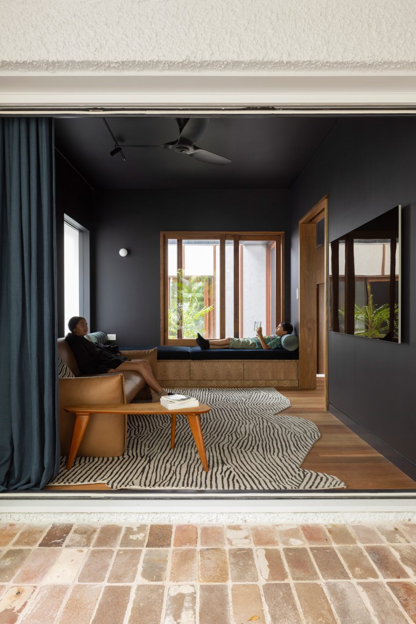 Children relaxing in living room