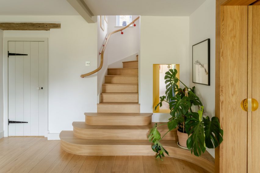 Timber staircase with curving bannister
