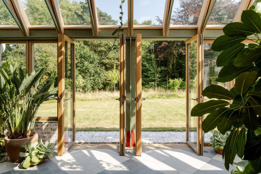 Wooden doors opening out from conservatory