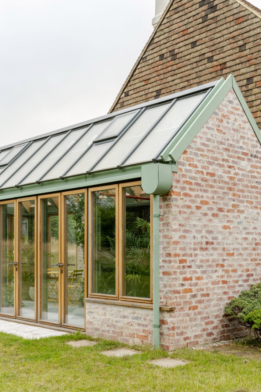 Conservatory with brick walls